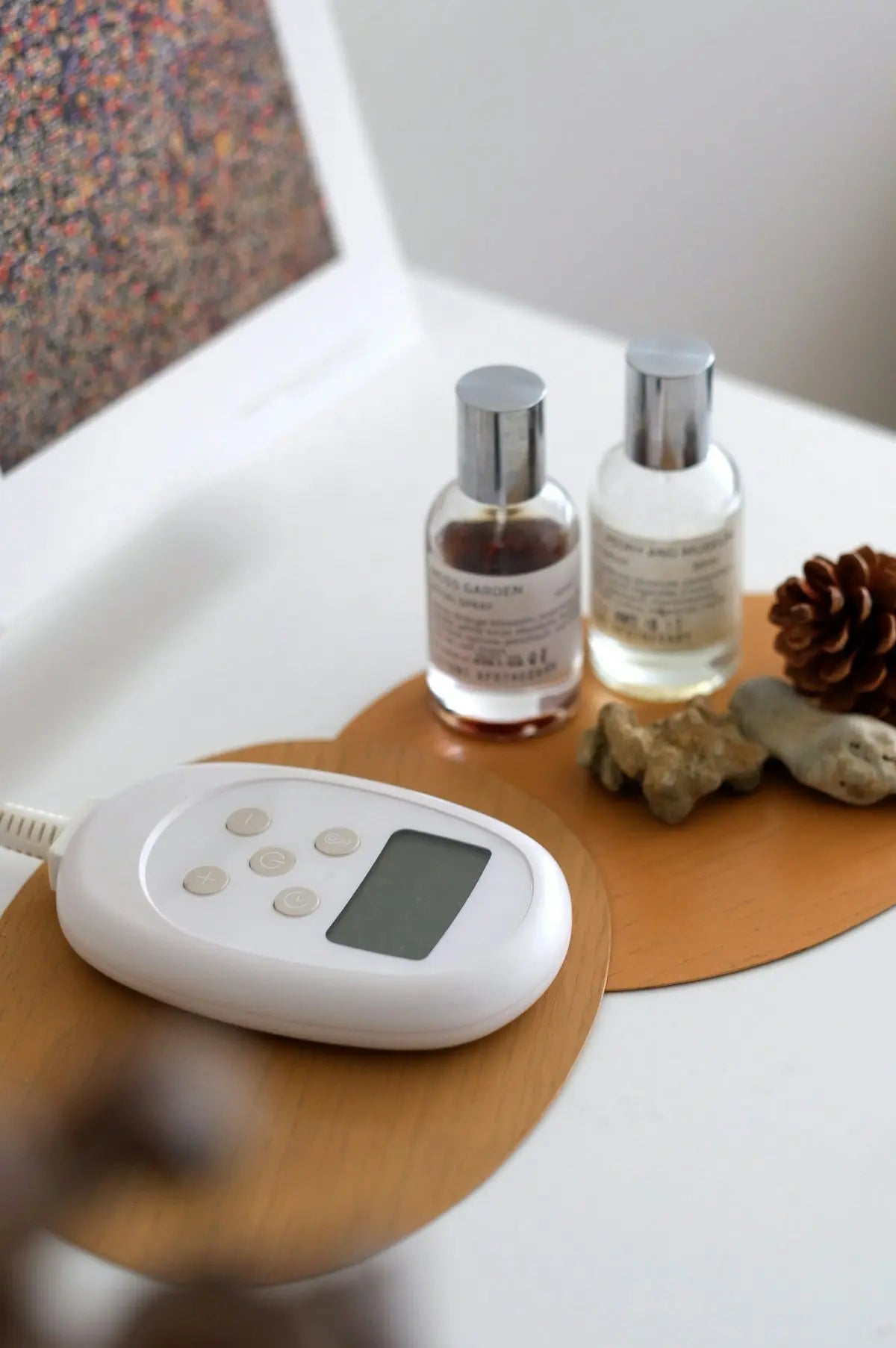 A small scale with a digital thermometer on top of it