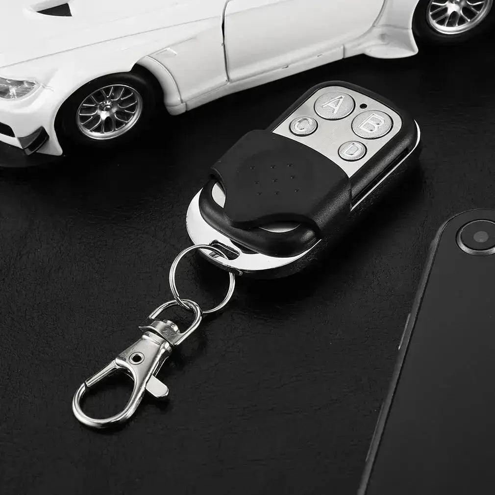 433MHz 4Button ABCD/Lock Unlock Remote Control Metal Push Button Transmitter Universal 4 Buttons Garage Door Opener Remote Magic Remotes